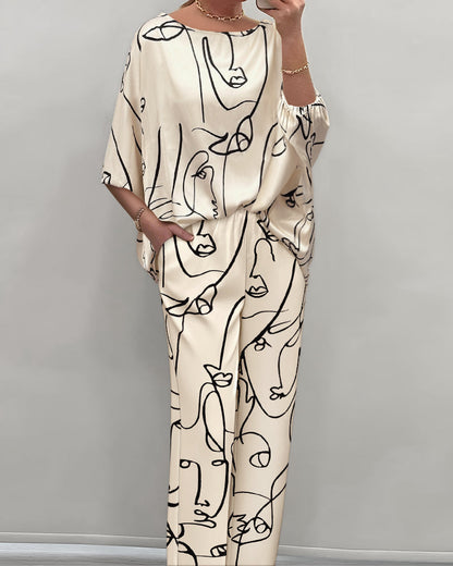 Women's Abstract Face Print Two Piece Outfits Boat Neck Batwing Sleeve Top and High Waisted Wide Leg Pants Set with Pockets