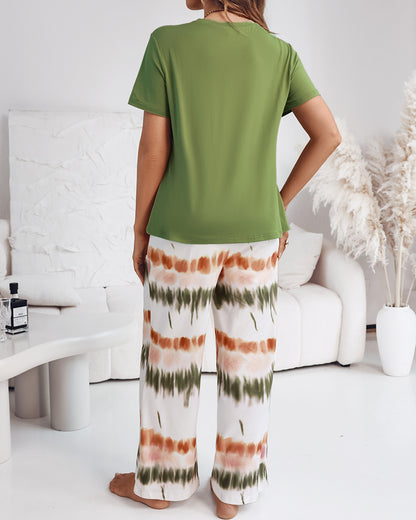 2 Pieces Outfit Letter print Round Neck Short Sleeve Top and Tie Dye Print Elastic Waist Loose Fit Pants Set Casual Pajamas Set